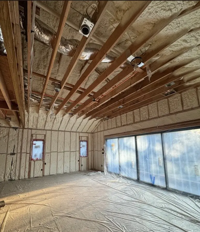 Interior walls and ceiling insulated with spray foam during new construction in Florence